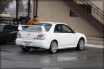 Chris' White STI parked