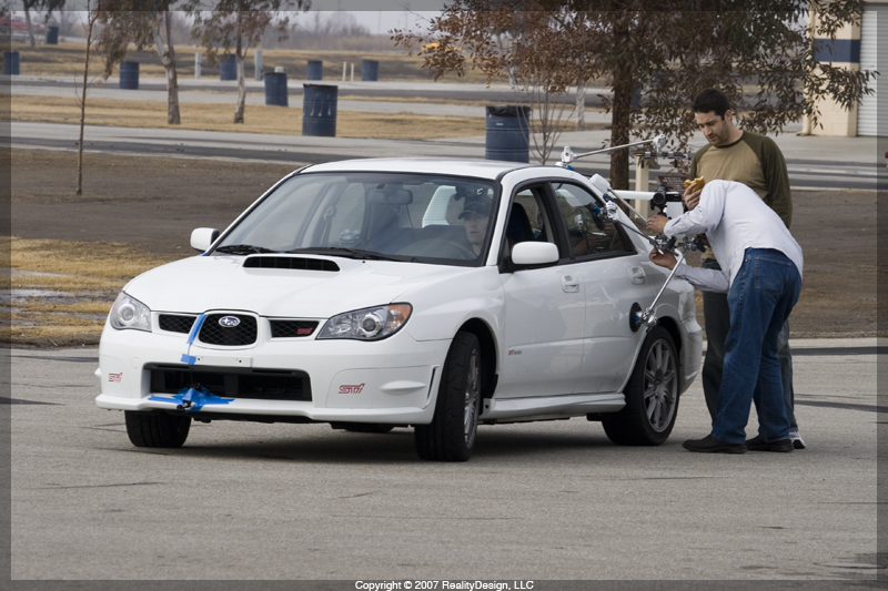 Chris' White STI - instaling camera equipment