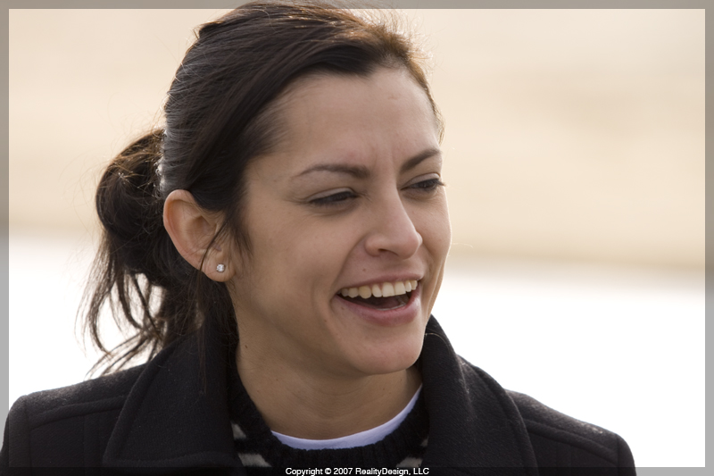 Selena laughing at the race track