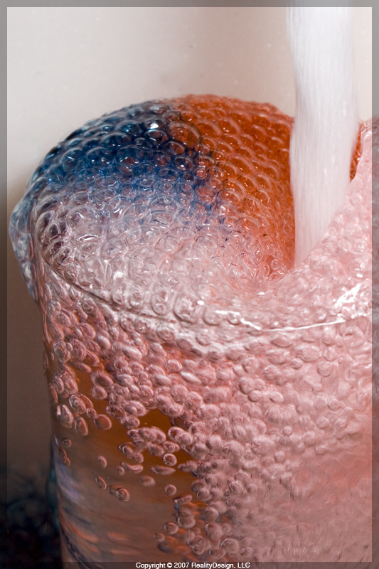 Water in a glass with food coloring #6